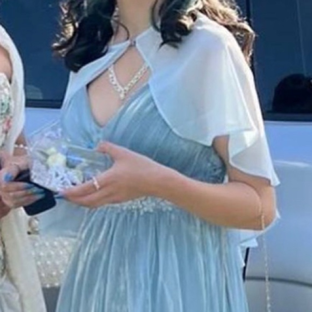 Baby blue cover up with gem over the shoulders